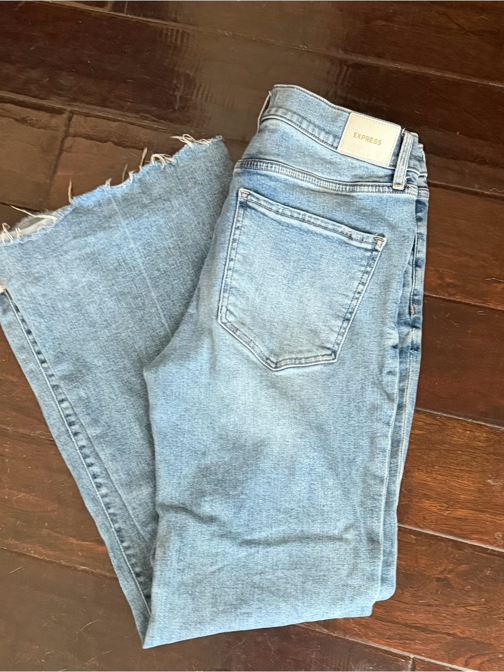 Express  70’s Flare Mid Rise Light Blue Distressed Hem Jeans for Women